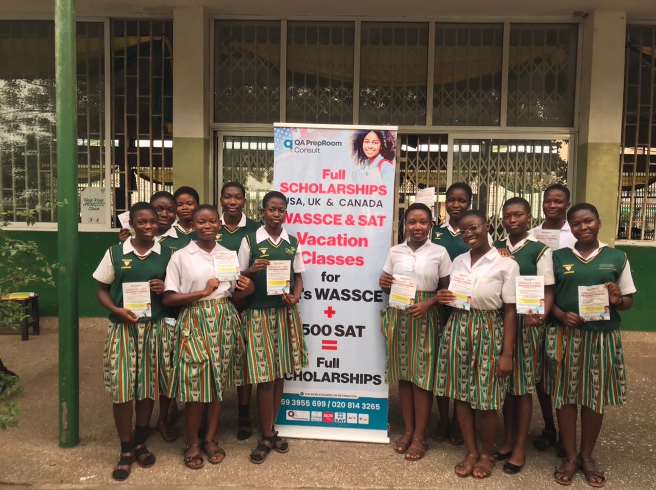 QA PrepRoom team with student at Aburi Girls